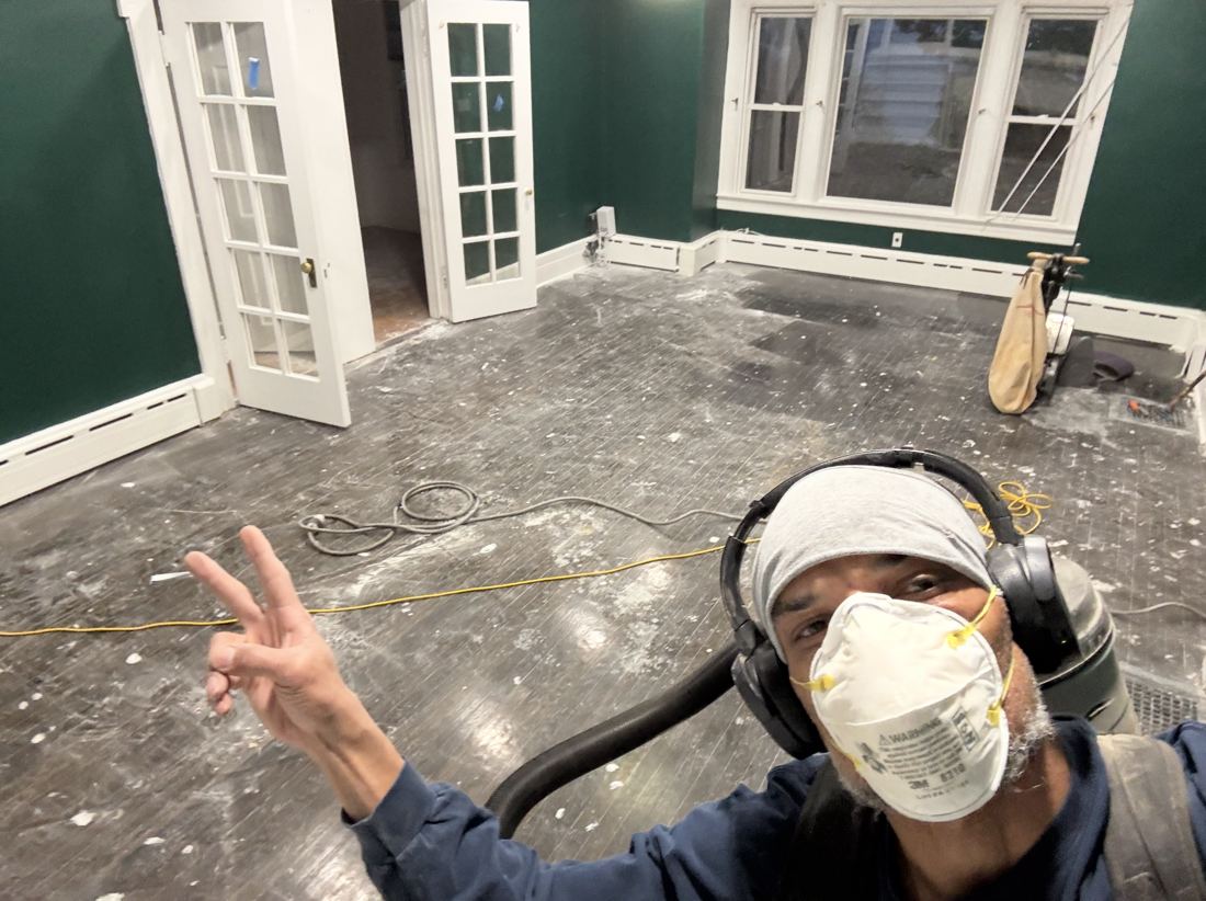 Hardwood floor sanded down to bare wood, before refinishing