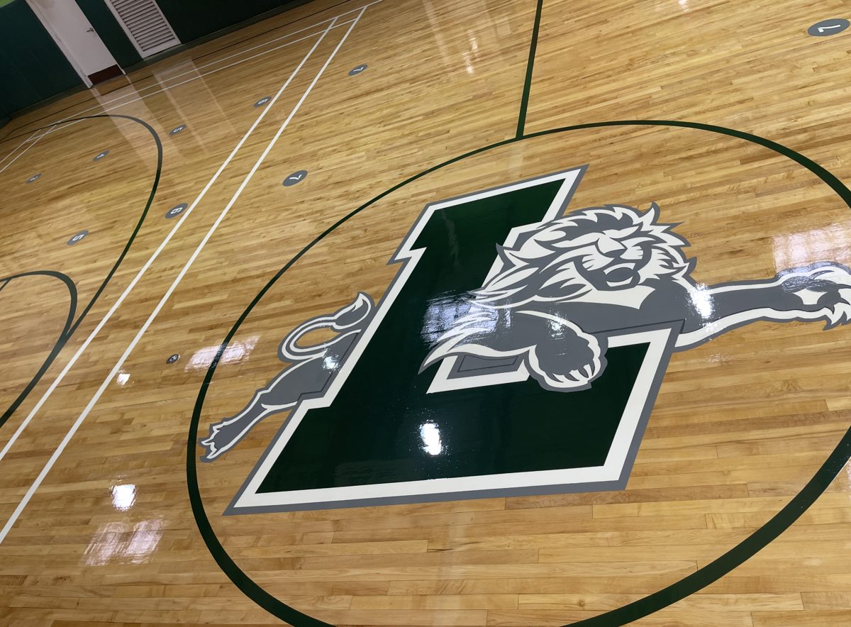 The new custom lion and L logo at center court under a glossy finish